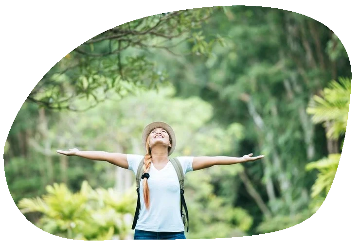 Young woman happy in nature